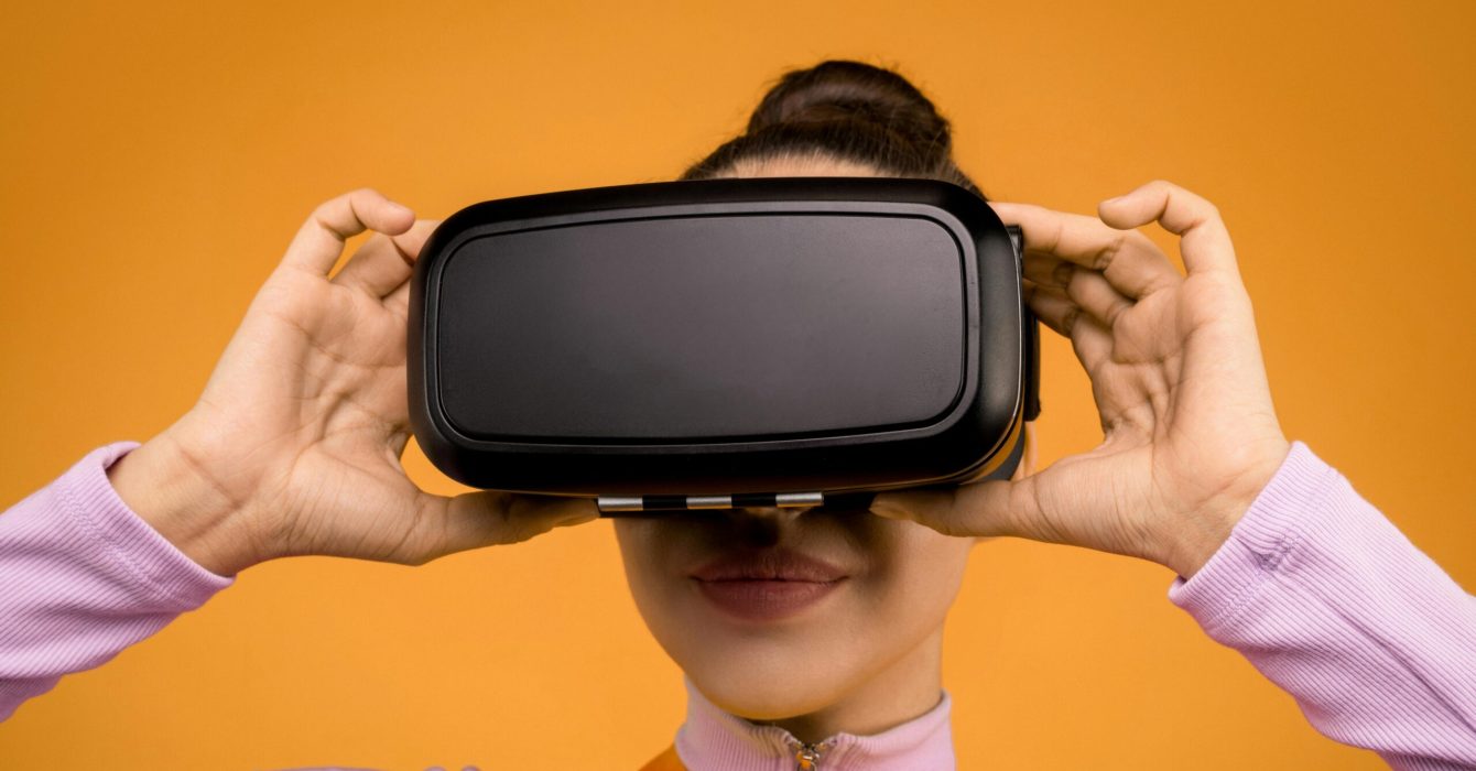 close up of a woman's face wearing a VR headset