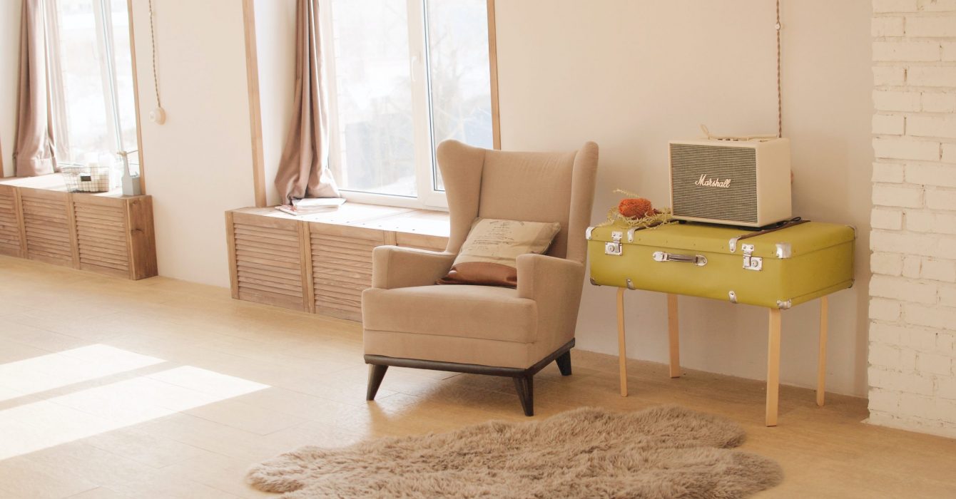 A modern living room featuring a suitcase coffee table.