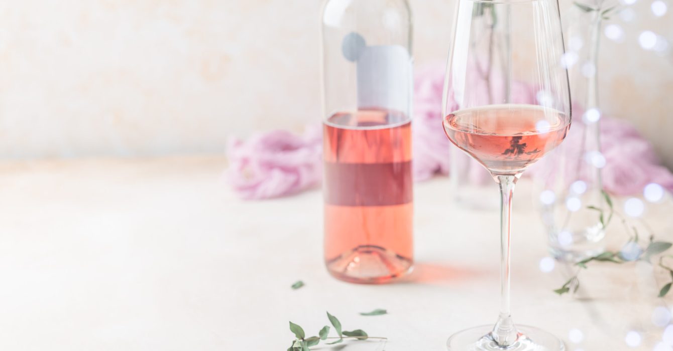 Glass and bottle of rose wine