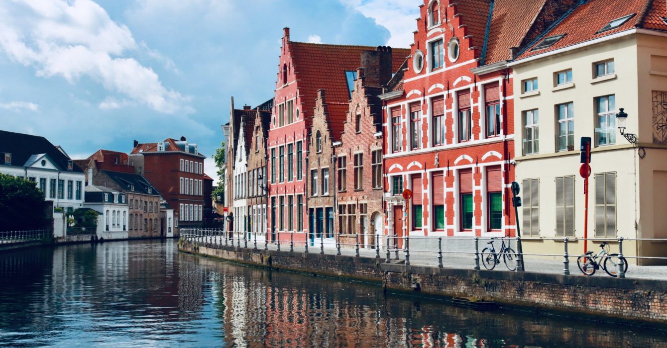 Colourful houses and buildings by the river in Bruges