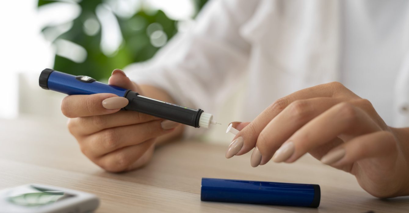 side-view-diabetic-woman-checking-her-glucose-level